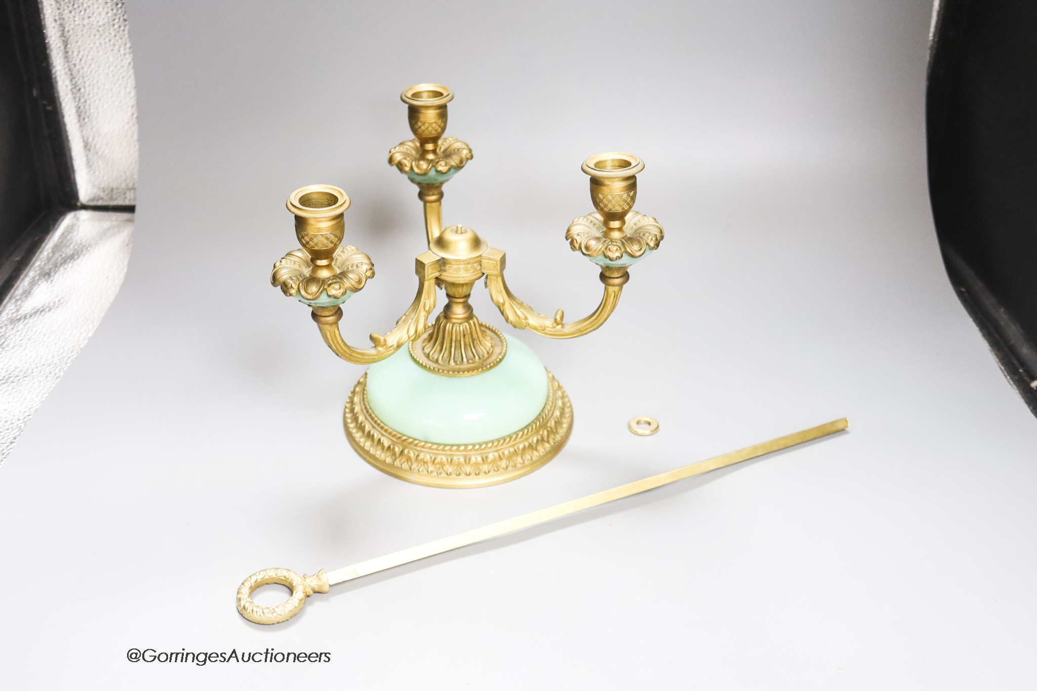 An ormolu lamp and a small print